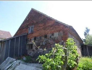 Syndyk sprzeda 1/4 udziałów w nieruchomości gruntowej zabudowanej w miejscowości Długie 115